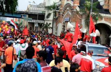 People wearing red gathered in Kuala Lumpur.